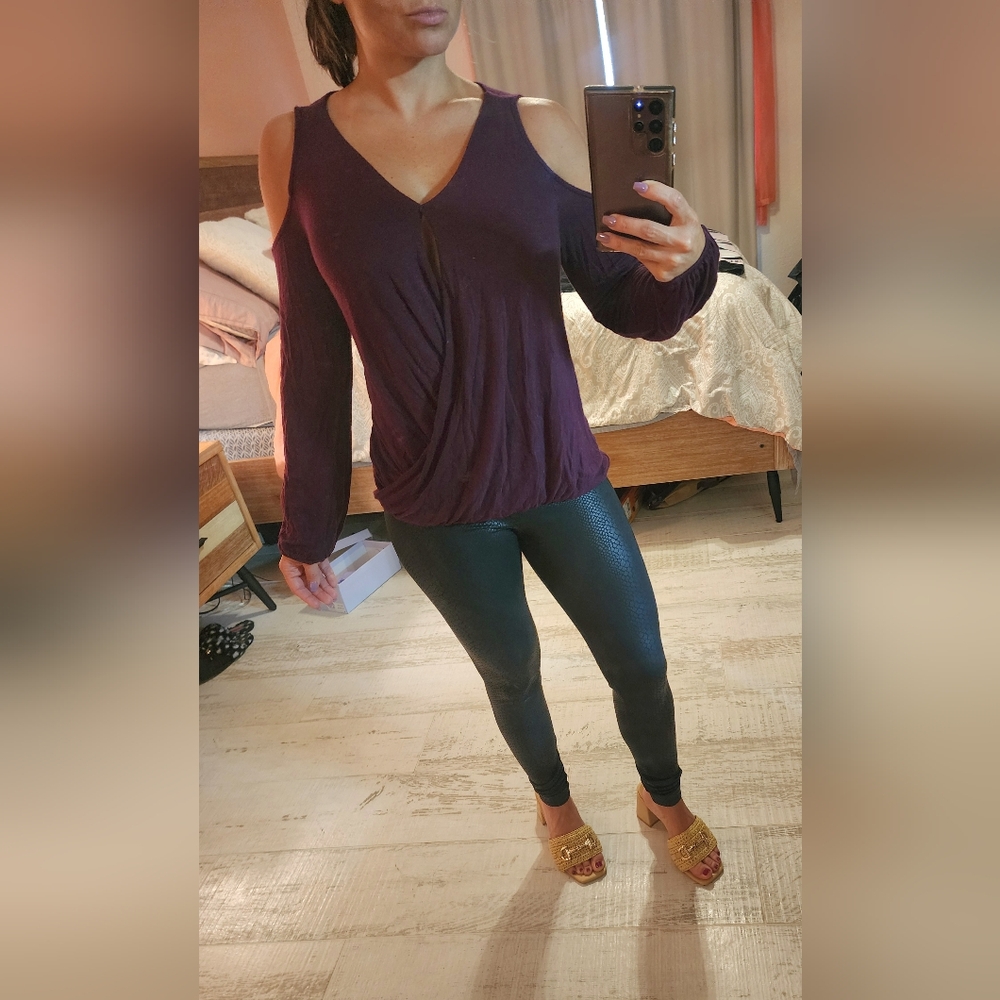 Dark purple sweater with openings
